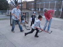 People playing ball hockey in Toronto; Image: Joyce Grant, www.teachkidsnews.com